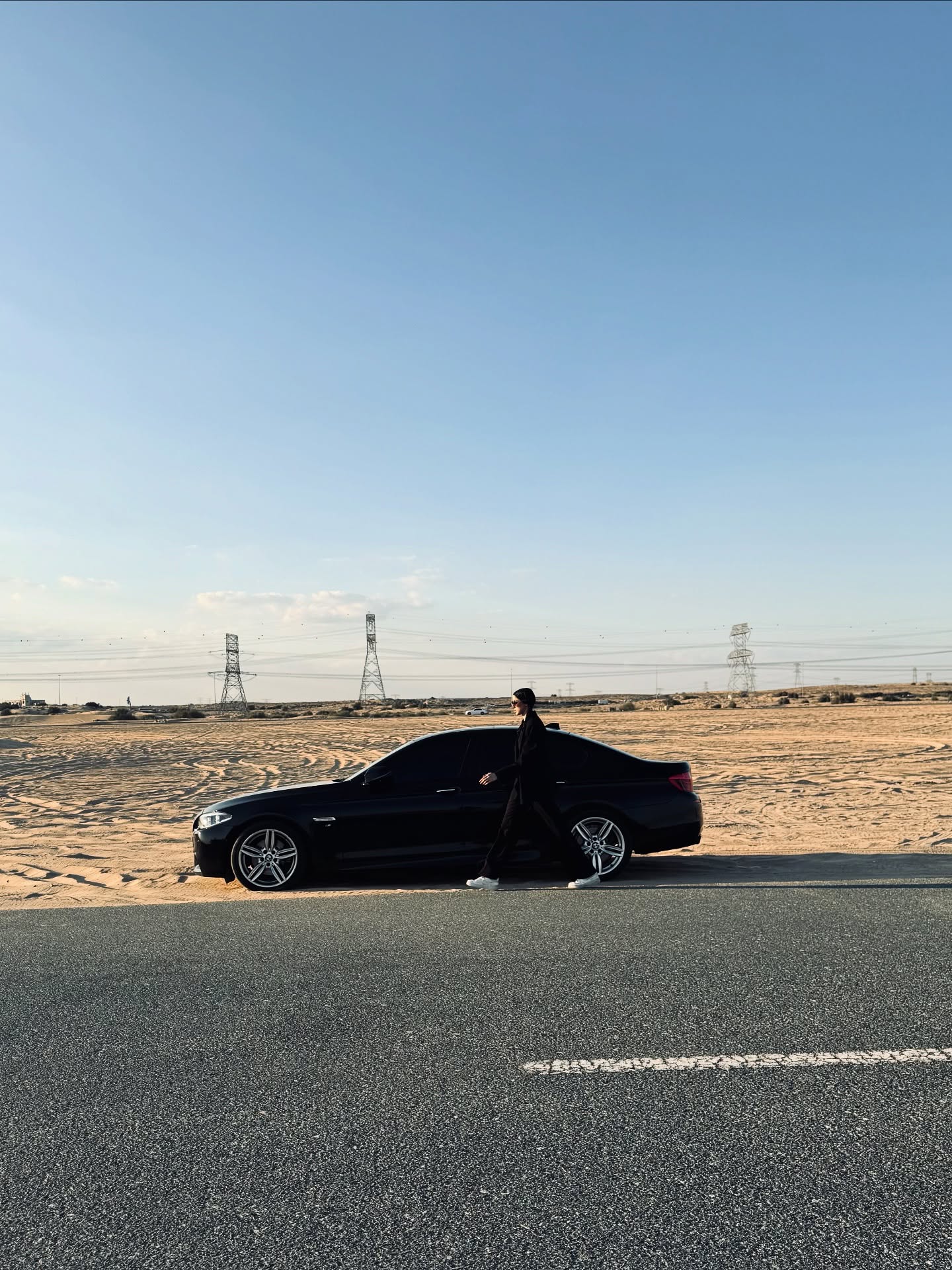 Wide shot - BMW on a desert highway